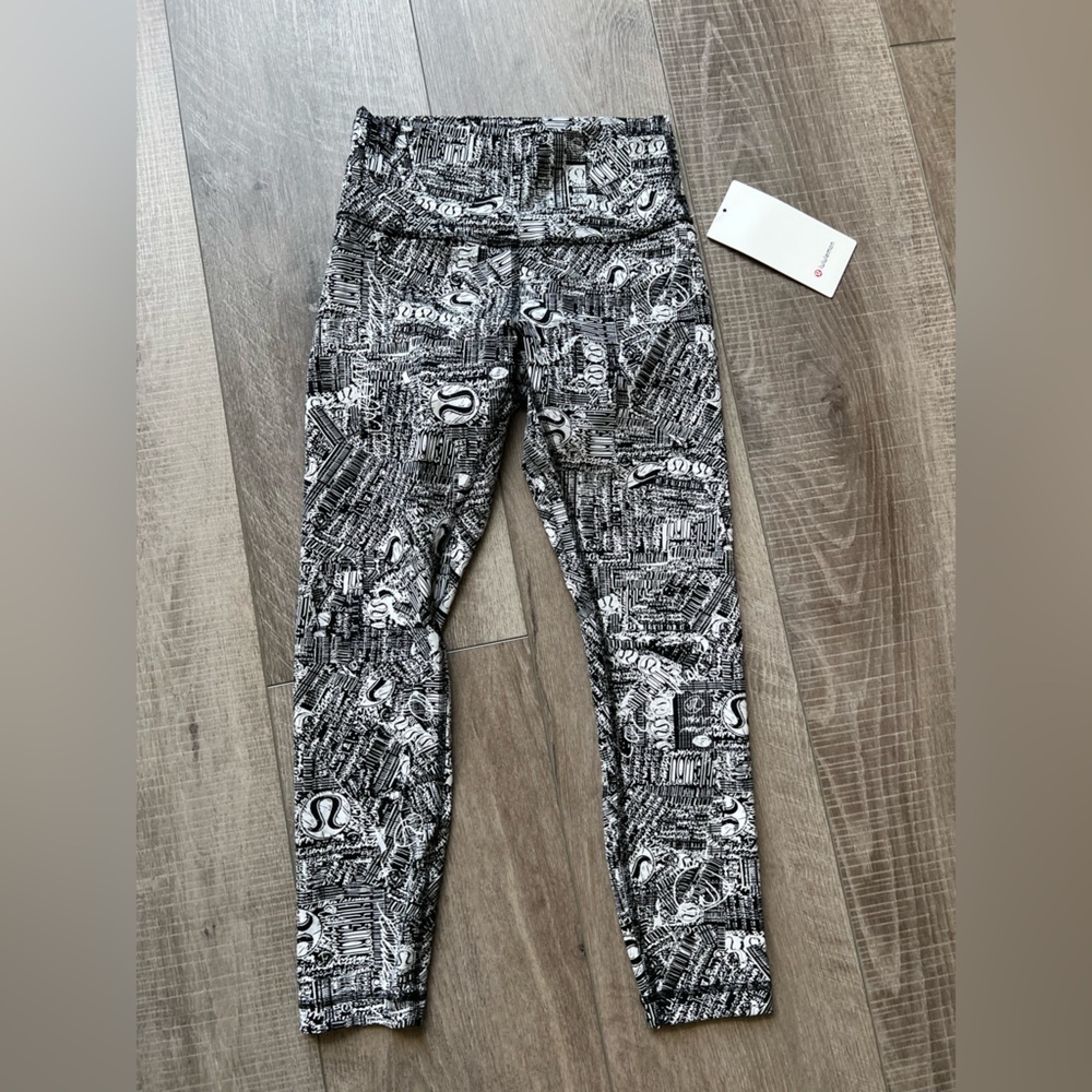 Lululemon Wunder Train High-Rise Tight 25" in Tear It Up Alpine White Black